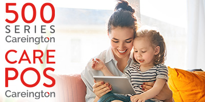 Mother and daughter looking at a tablet.